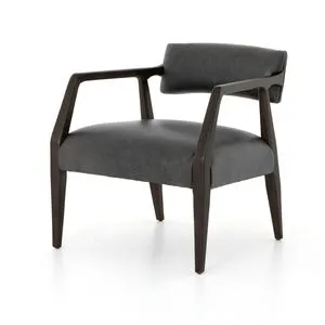 Tyler Chaps Ebony Arm Chair with angular dark smoky birch frame and black top-grain leather seat and low-slung back