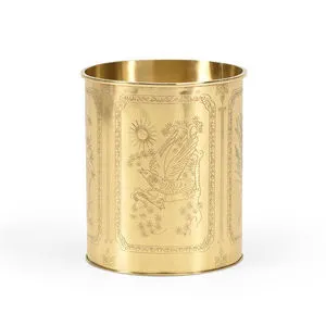 Brass waste basket with hand carved nature-inspired panels featuring birds and foliage, traditional round shape
