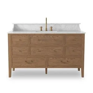 Elliston vanity with worn oak veneer, brass hardware, Italian Carrara marble top, and mixed drawer design