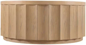 Round coffee table with scalloped light oak wood silhouette and hidden casters for easy mobility