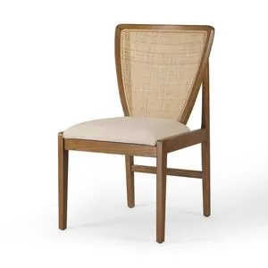 Front angle view of chair with tapered legs and woven cane backrest
