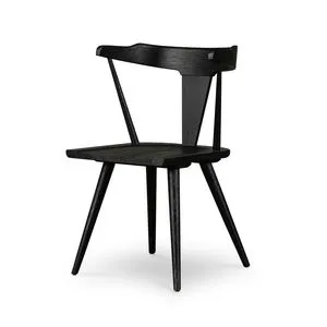 Ripley Dining Chair in soft black with bowed sculptural backrest and tapered legs in weathered oak grain