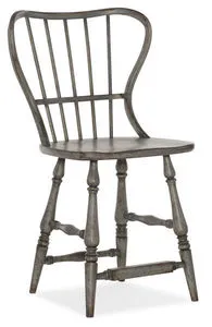 Speckled gray spindle back counter stool with gently worn antique patina and turned legs