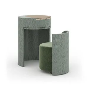 Curved bathroom vanity in verdigris swirl case with a lift-up gold-trimmed top and green upholstered pull-out chair