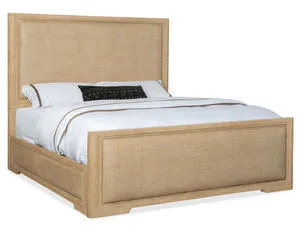 Retreat Queen Cane Panel Bed in dune finish with flat cut cathedral oak veneer and woven cane panels on headboard and foot...